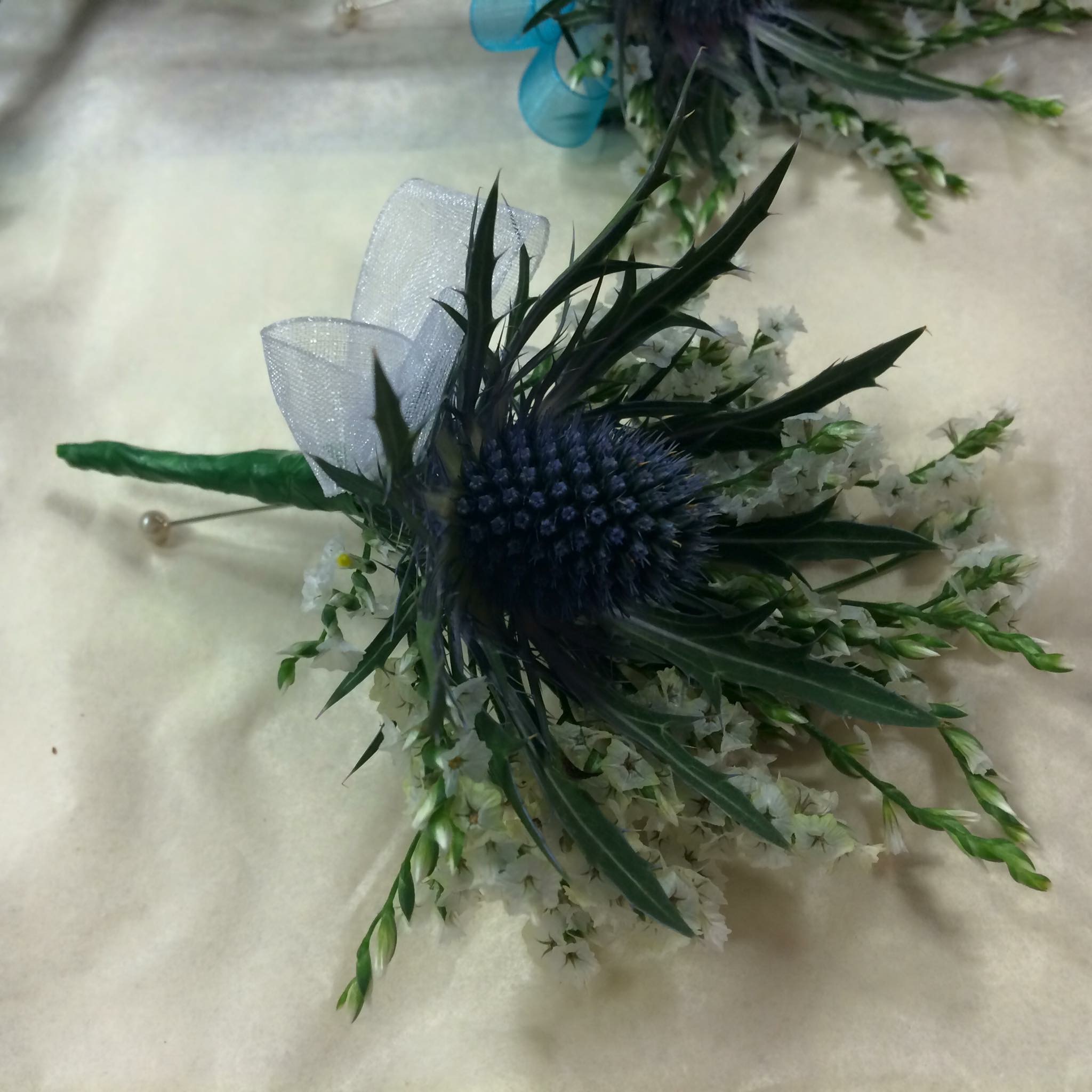 Gents thistle buttonhole Irene's Florist